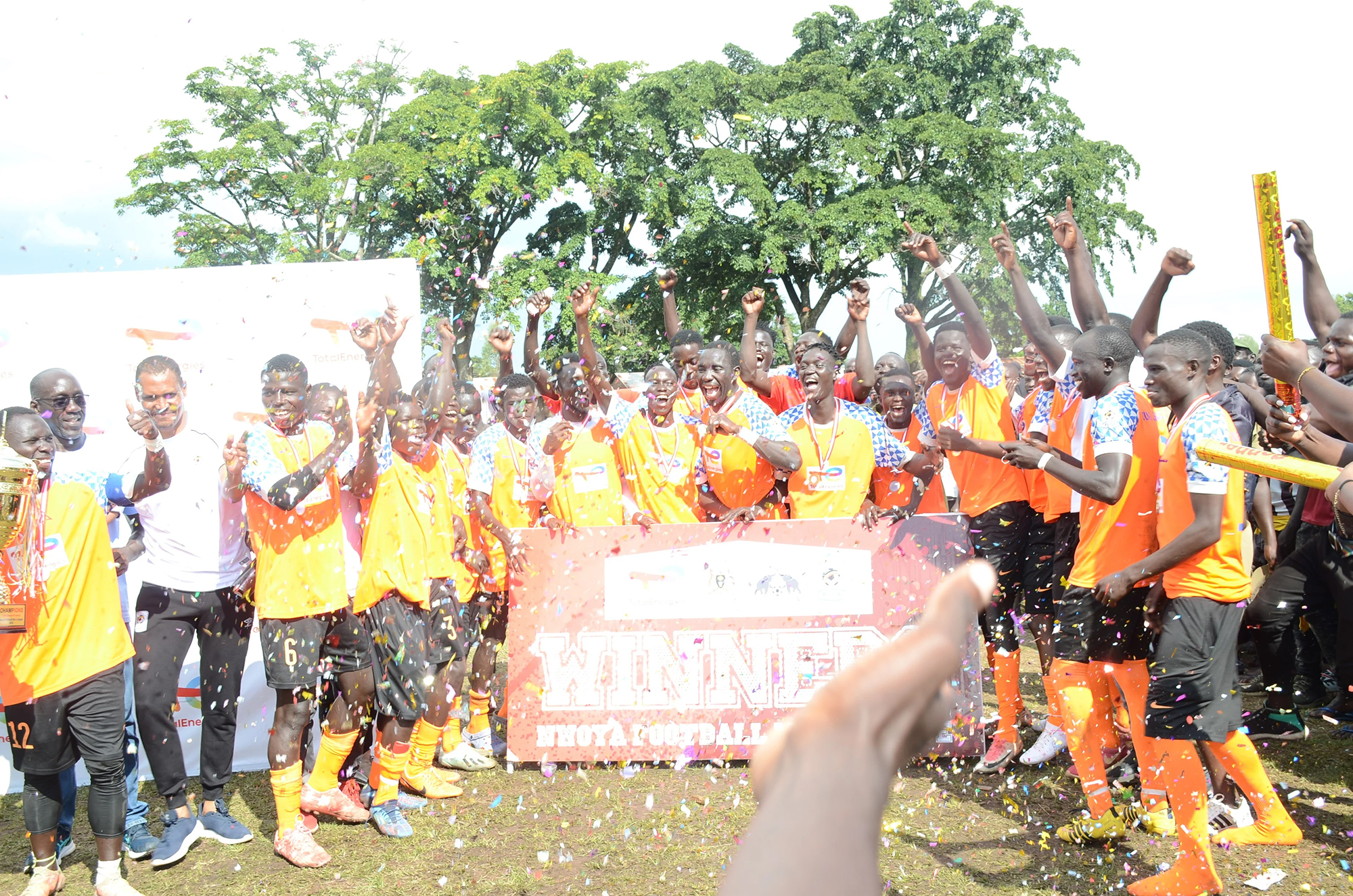 Young Elephant players celebrating after beating Black at Anaka Primary school playground